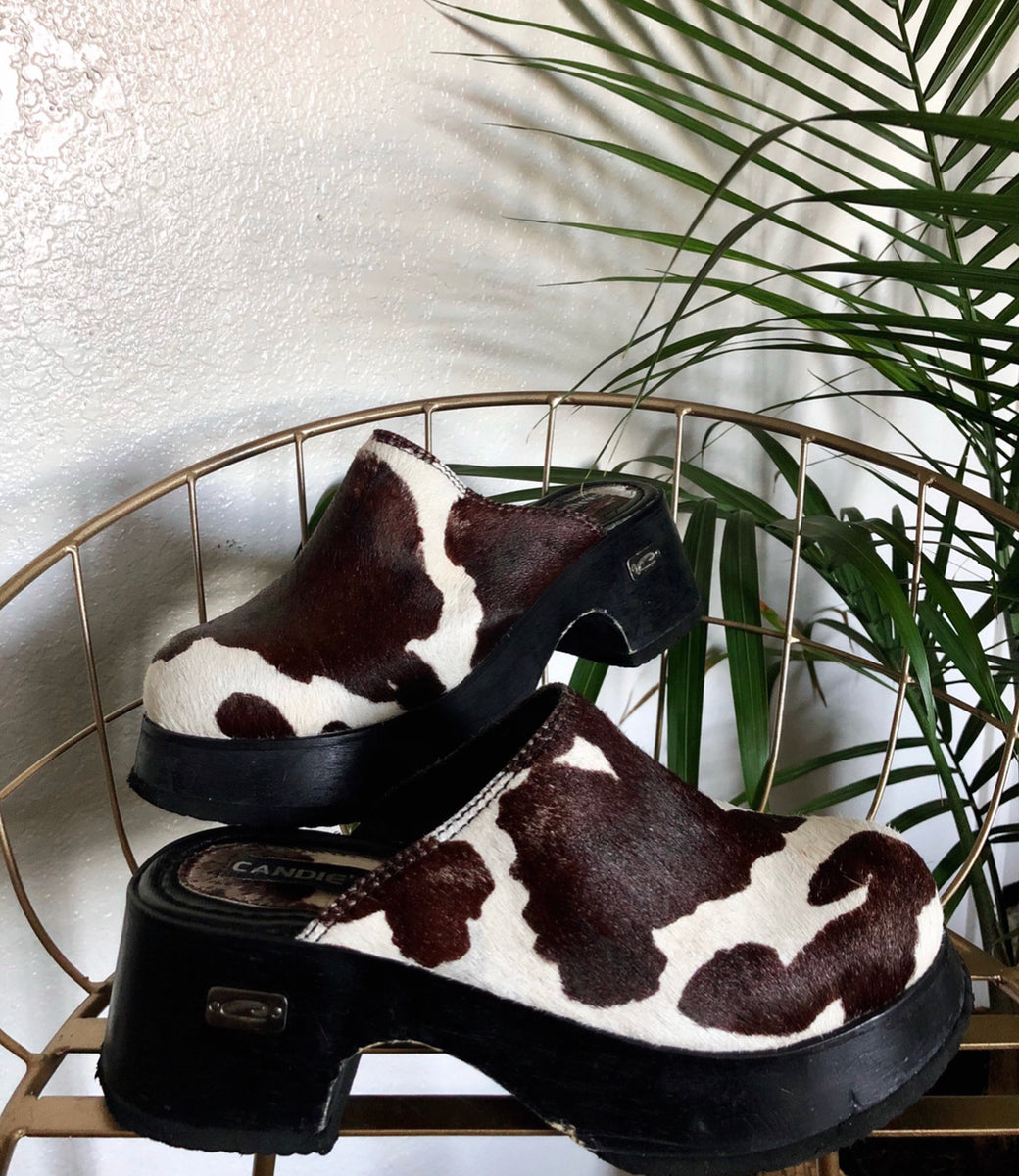 Cow hot sale print clogs