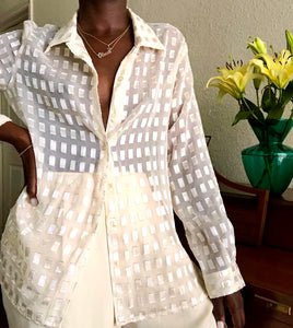 sheer cream blouse