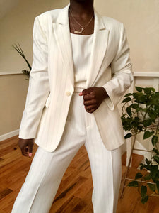 cream pinstripe three-piece suit