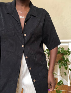muted black tropical button up